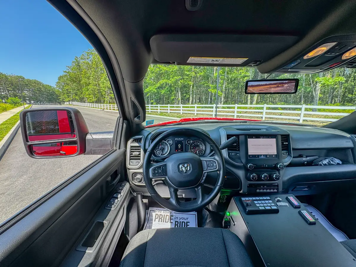 Front interior wide view from passenger side showing seats and control console.